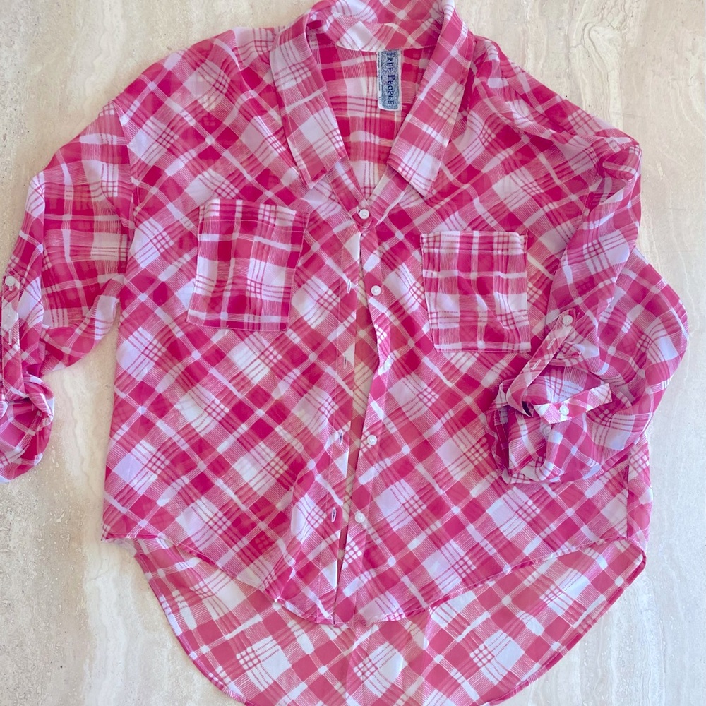 Free People high-low top. Roomy for a Sz x-small.